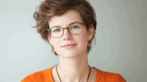 a woman wearing glasses and a necklace