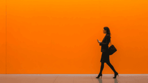 a woman walking with a phone
