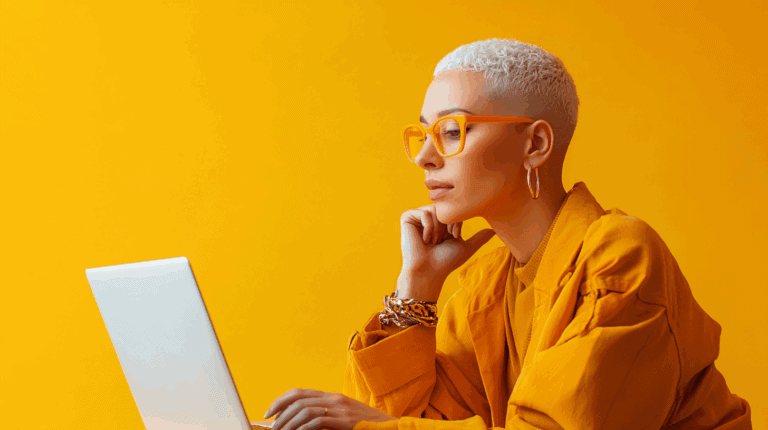 a woman with short white hair and yellow glasses