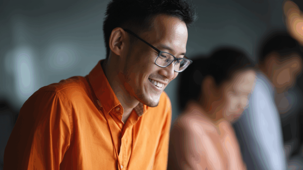 a man in an orange shirt