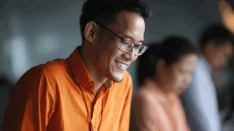a man in an orange shirt