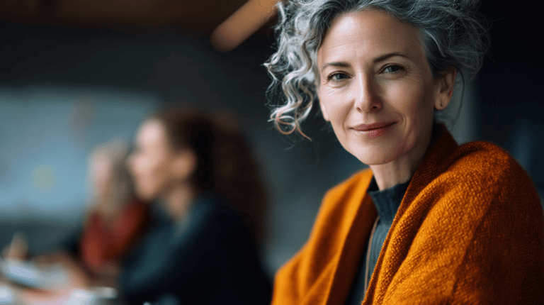 Confident woman in a meeting setting.